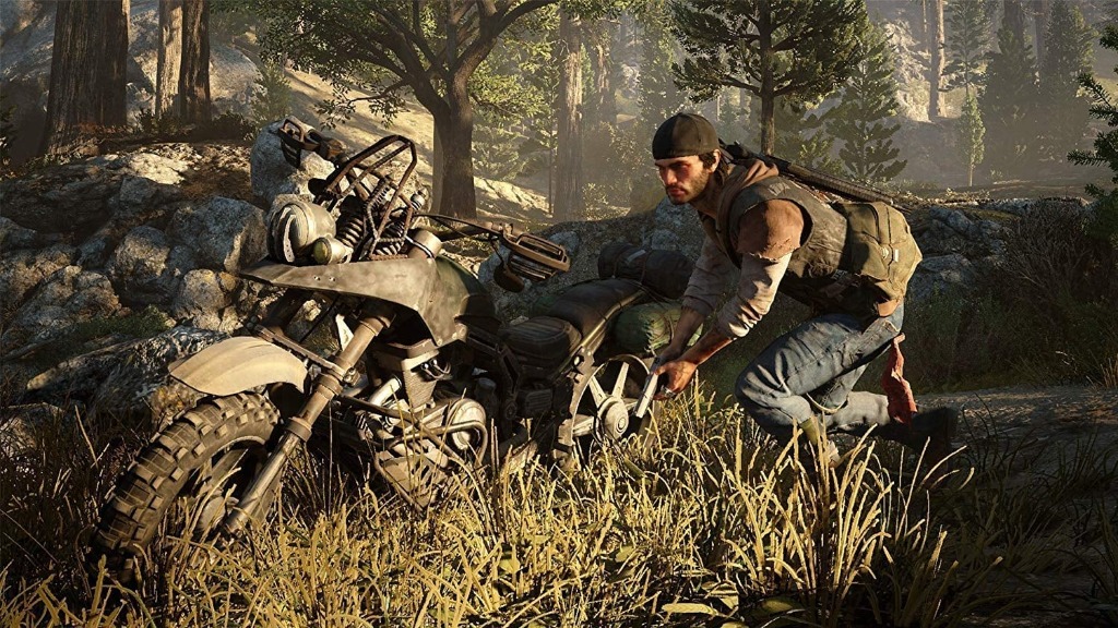 A survivor crouching beside his motorcycle in tall forest grass